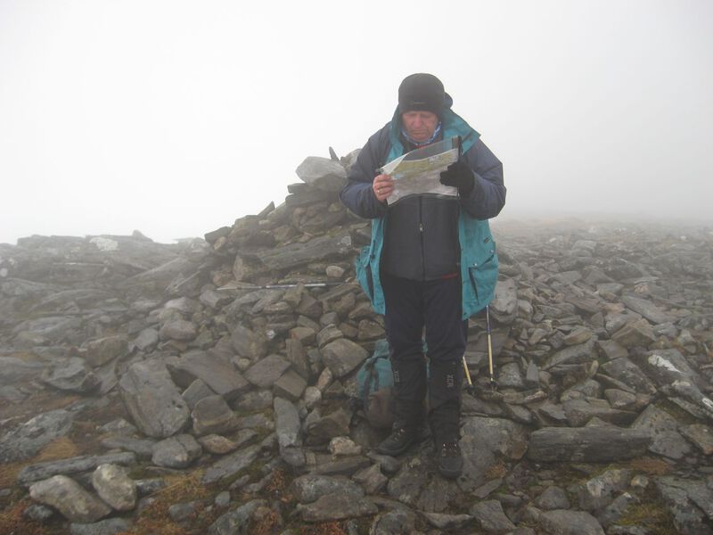 Allan on the summit of Beinn aChaorainn