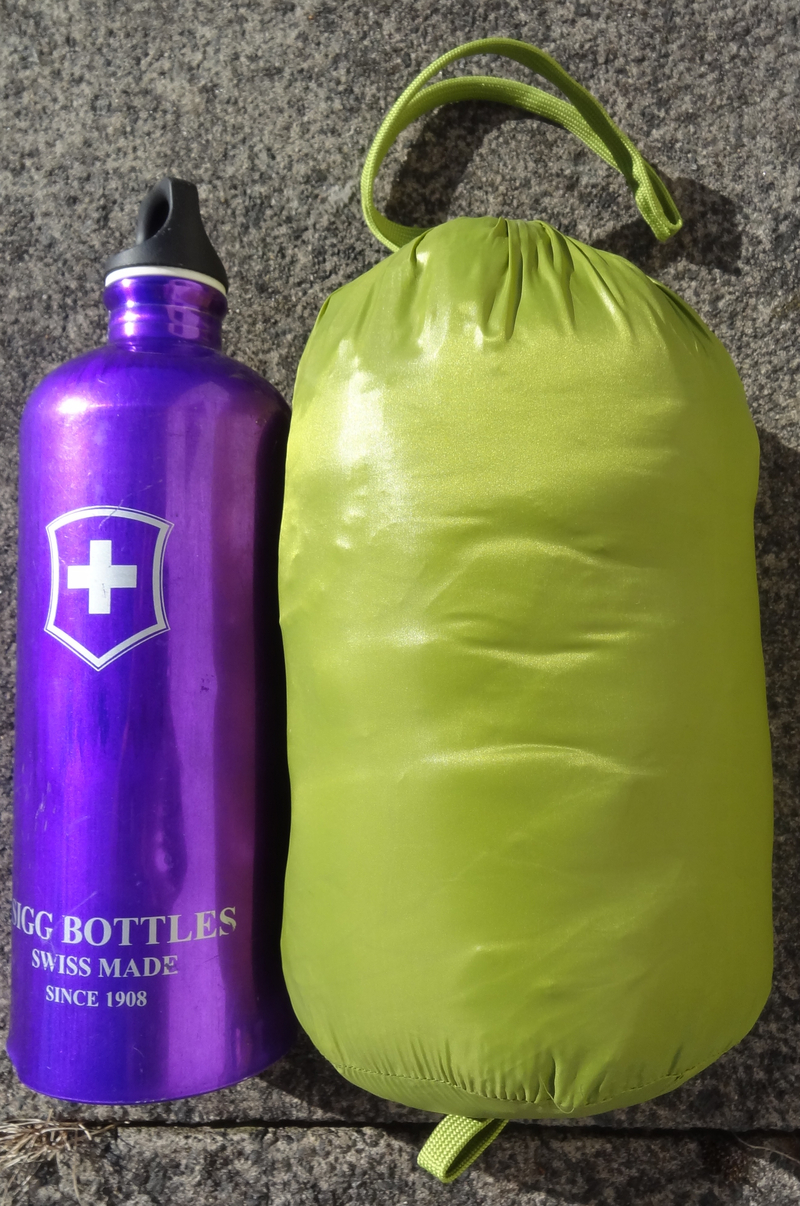 UL down jacket next to Sigg bottle